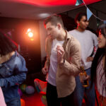 Dubai nightlife venue with colorful club lighting and dance stage