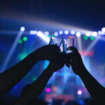 Energetic crowd dancing under dazzling lights at Zodiac Russian Club, the best club for Saturday night with a vibrant dance floor and luxury interiors.