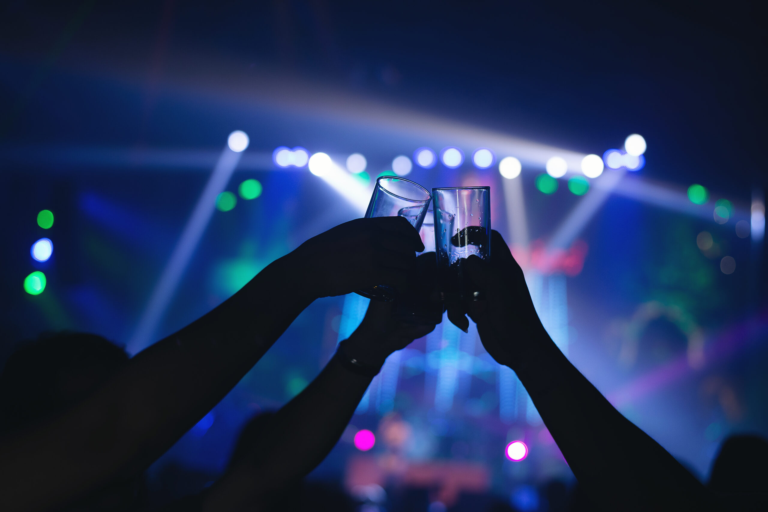 Energetic crowd dancing under dazzling lights at Zodiac Russian Club, the best club for Saturday night with a vibrant dance floor and luxury interiors.